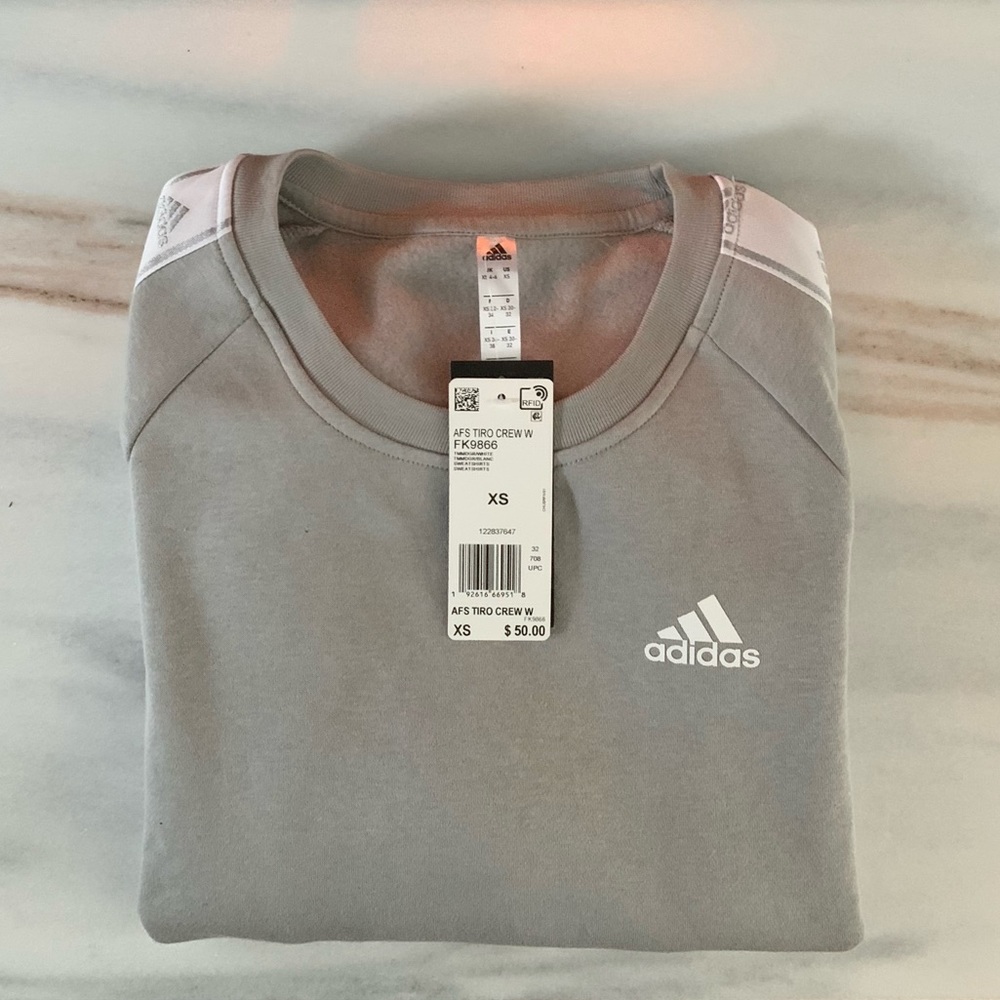 ADIDAS crew neck sweatshirt, never worn. SIZE XS